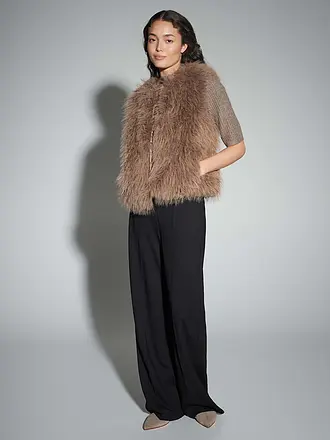 OPUS | Chaleco con aspecto de piel WONDRA
Marca: OPUS
Color: camel
Categorías: Moda,Mujer

Largo de manga: Sin mangas
Escote: Cuello redondo
Material: Piel sintética,Poliéster / Poliamida
Diseño: Liso
Corte (Prenda exterior): Suelto
Estilo: Pure | 